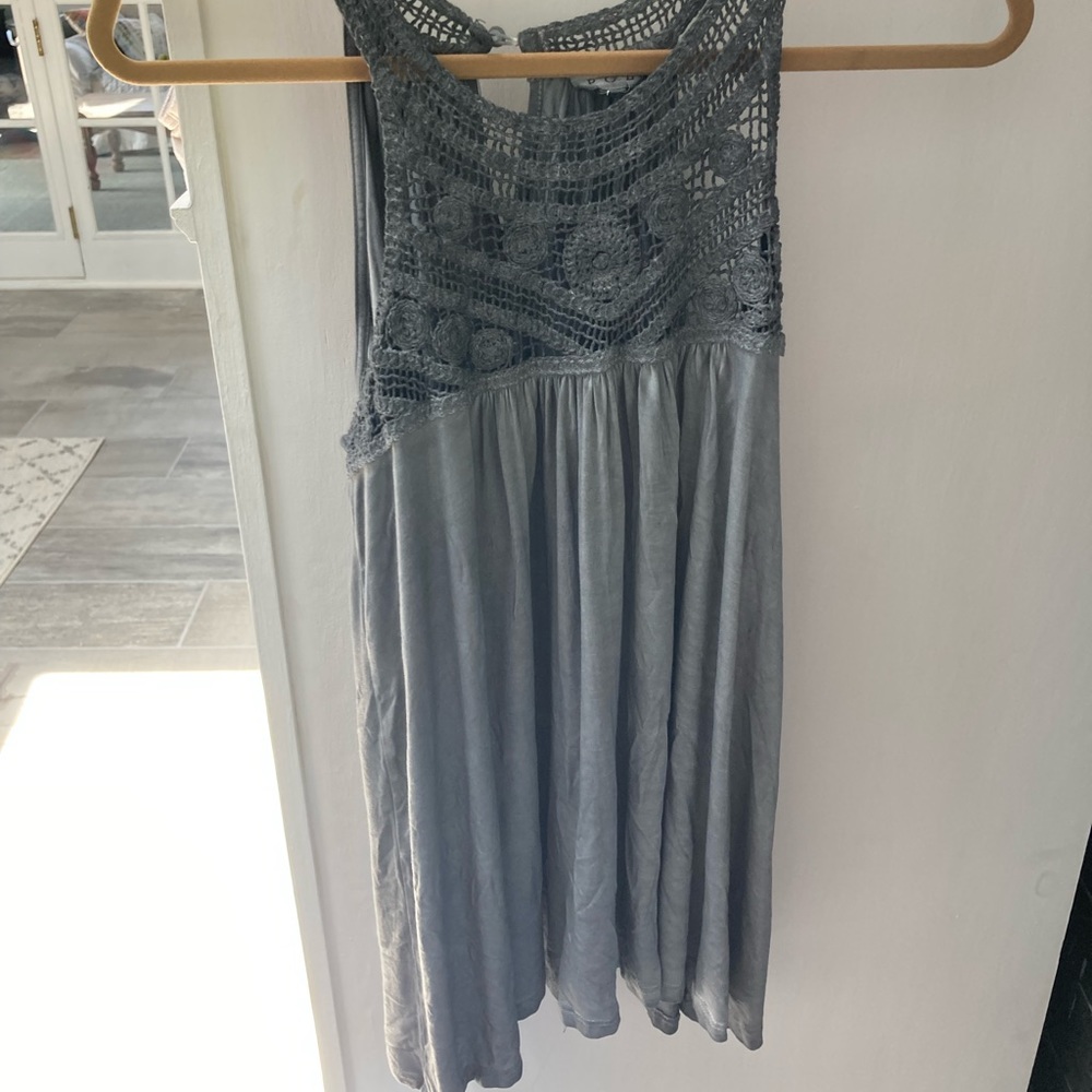 New W/O tags sleeveless crochet accent top.  Perfect to dress up or wear casual.
